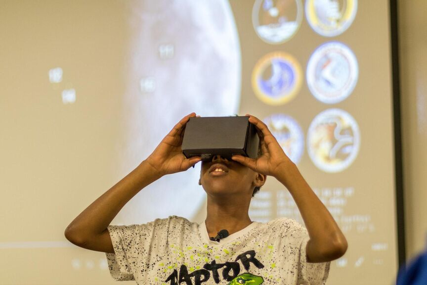 Boy using a VR headset