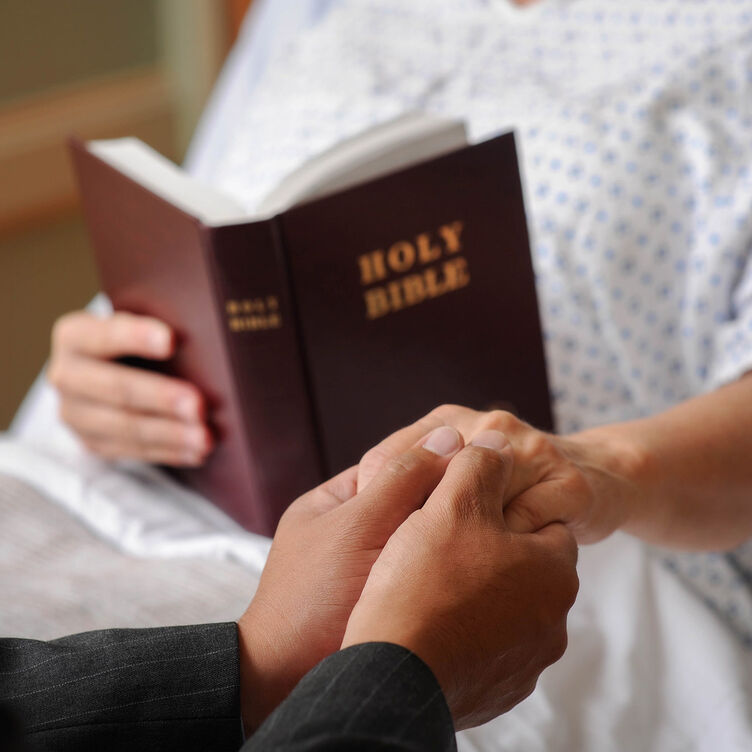 Chaplain with patient