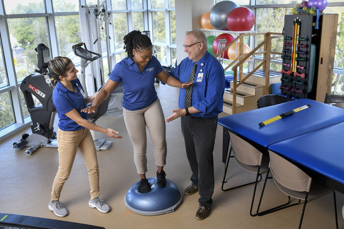 Physical Therapy students doing a balance exercise